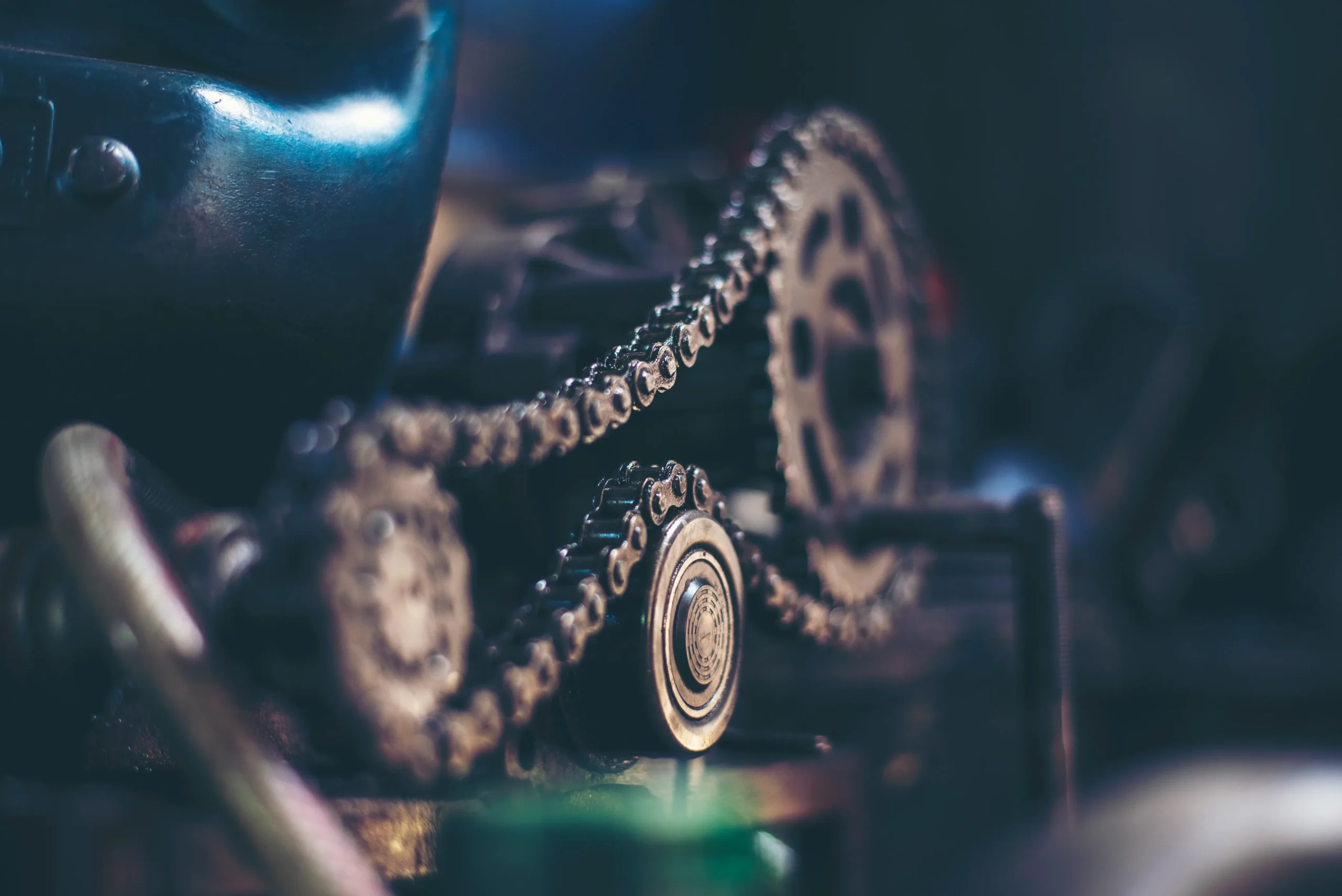 Chain of a machinery getting fixed.